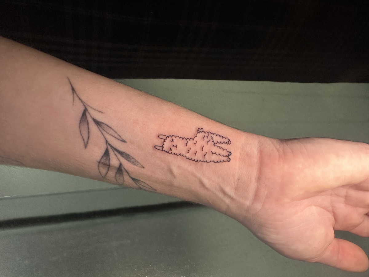 Fine Line Tattoo